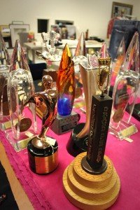 A selection of awards and honors received by Alan Jackson (the total number of them, he says, is “overwhelming”) awaits final placement in his Hall of Fame exhibit. PHOTO COURTESY OF THE CMHOF / PHOTO BY DREW MAYNARD