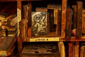 Even the tiniest of etched blocks receive the utmost of care at Hatch, with shelves full of designs hand-made and processed, some no bigger than the palm of your hand. PHOTO BY RUSS CORLEY