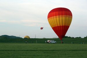 A couple of hot air balloons end their evening trips in a field north of Franklin. PHOTO BY BILL HOBBS