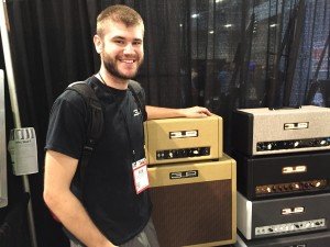 3RD POWER's Rob Shollenberger proudly stands aside the company product line. CEO James Scott has housed his team in East Nashville for the past six years. PHOTO COURTESY MARC NATHAN