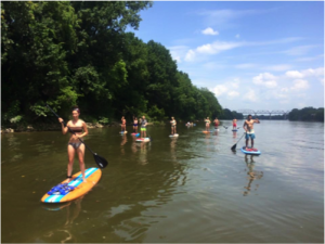 Paddling down the Cumberland River on a SUP Tour with Big Willie’s Action Sports. PHOTO COURTESY BIG WILLIE'S ACTION SPORTS
