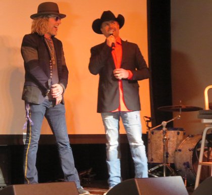 Big Kenny and John Rich on stage at Rich's home celebrating the success of their album "Gravity." PHOTO BY CILLEA HOUGHTON