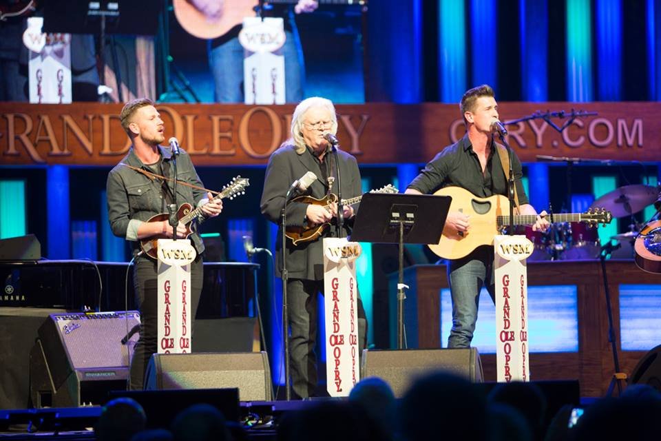 Brad and Curtis Rempel of High Valley perform with their idol, Ricky Skaggs, at the Grand Ole Opry. PHOTO COURTESY OF HIGH VALLEY